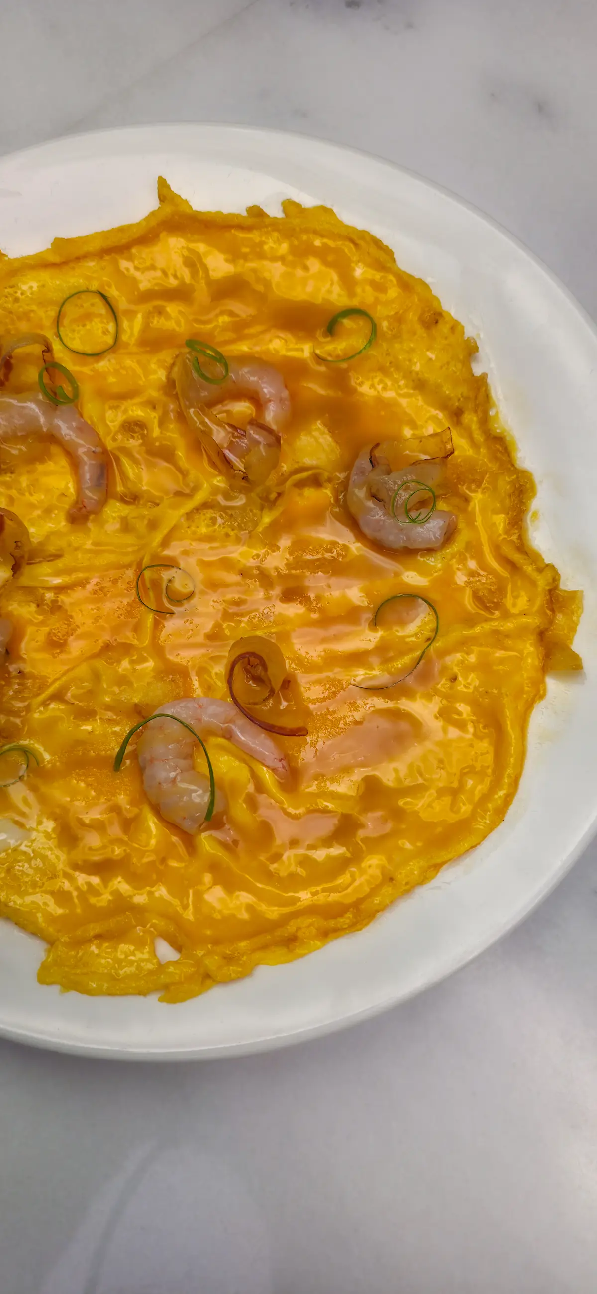 Tortilla vaga de gambas al ajillo y papada